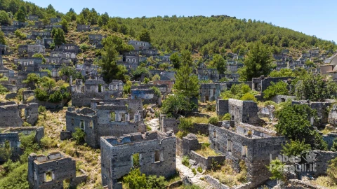 historical-lycian-village-kayakoy-fethiye-mugla-turkey-drone-aerial-shot-from-ghost-town-kayakoy-greek-village-evening-moody-warm-sun-ancient-city-stone-6
