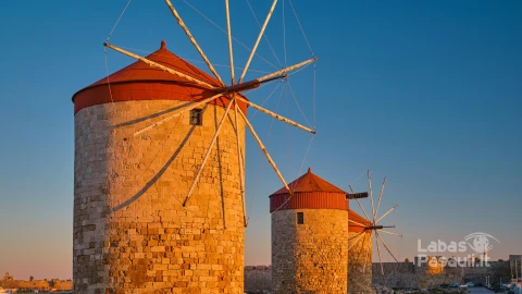 windmills-shore-bay-during-sunset-city-rhodes-island-rhodes-island-dodecanese-archipelago-europevacation-popular-travel-destination