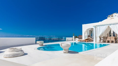 amazing-landscape-infinity-pool-caldera-view-santorini-greece-leisure-lifestyle-pool-chairs-sea