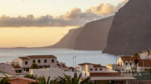 small-village-by-stone-cliffs-min