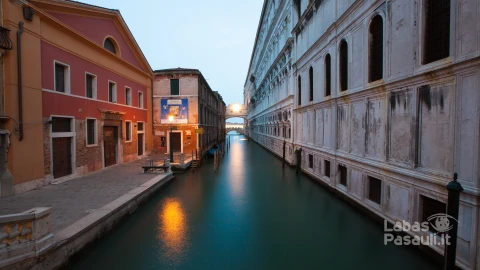 street-crossed-by-canal-min