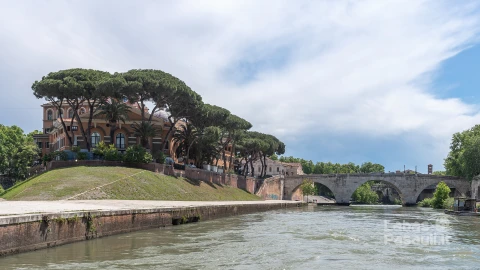 arch-bridge-river-against-cloudy-sky