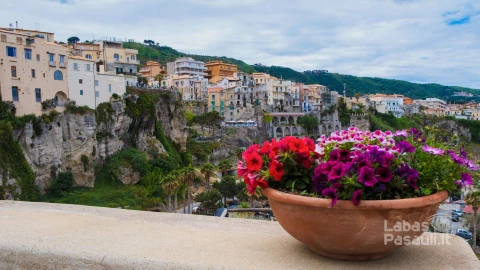 high-angle-view-townscape-tropea-against-sky-min