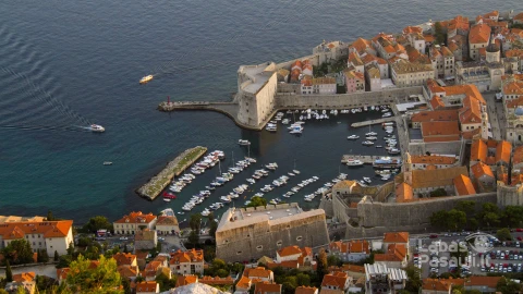 aerial-shot-mountain-srd-dalmatia-croatia-with-its-cute-orange-houses-busy-streets-min