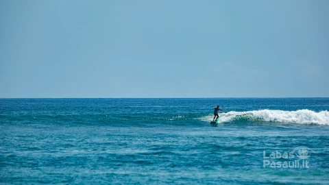 surfer-blue-wave-min
